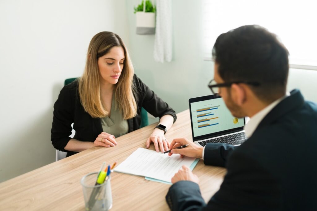 A person reviewing business contract with client